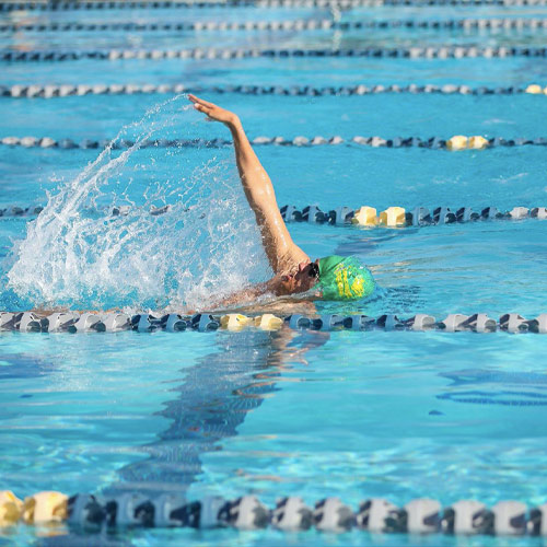 Kyle Benjamin competes in the backstroke